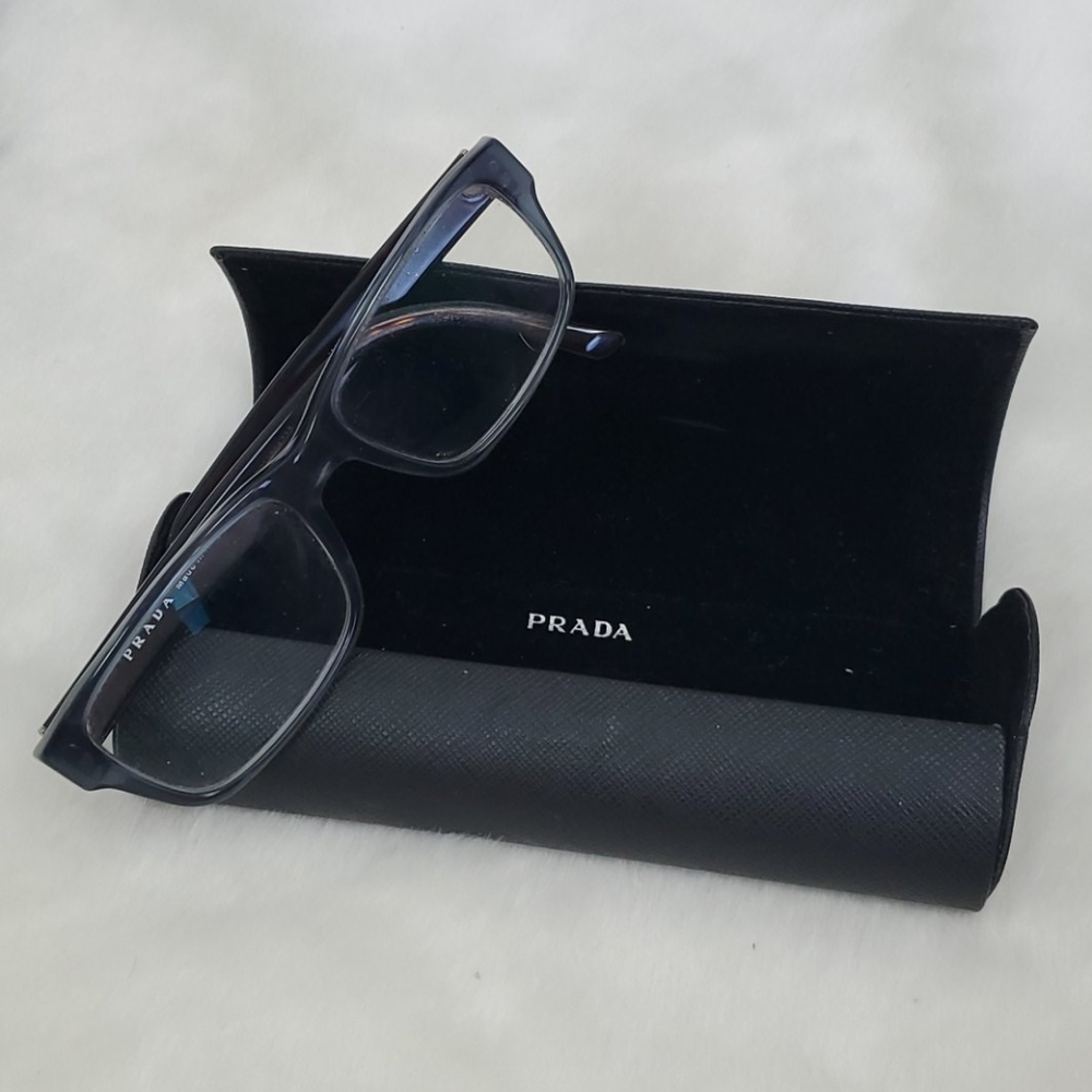 Prada glasses and leather case made in Italy